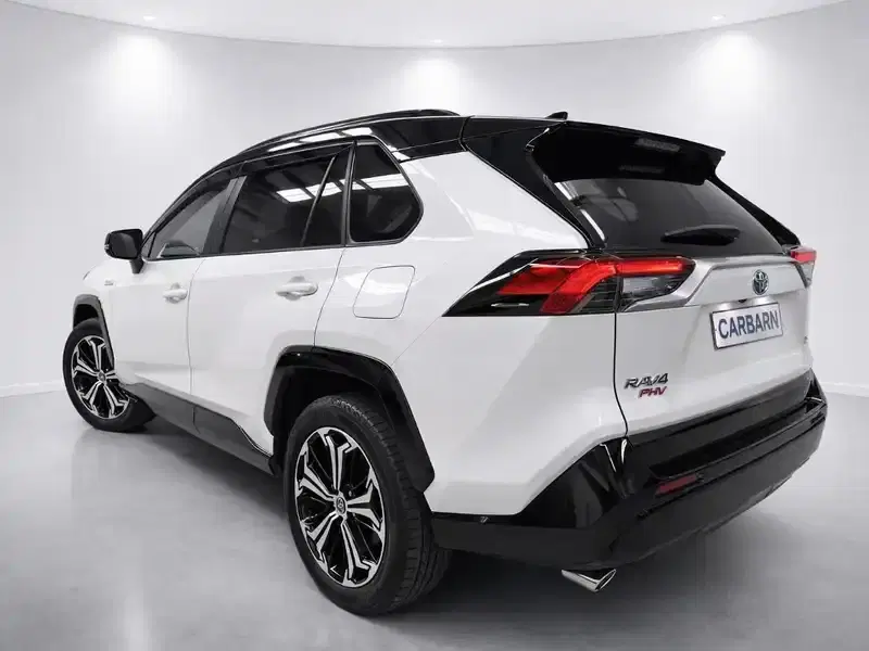 2022 Toyota RAV4 AXAP54 in Pearl — exterior view 4 2022 Toyota RAV4 AXAP54 in Pearl — exterior view 4