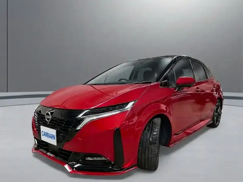 2023 Nissan AURA FE13 in Red — exterior view 2 2023 Nissan AURA FE13 in Red — exterior view 2