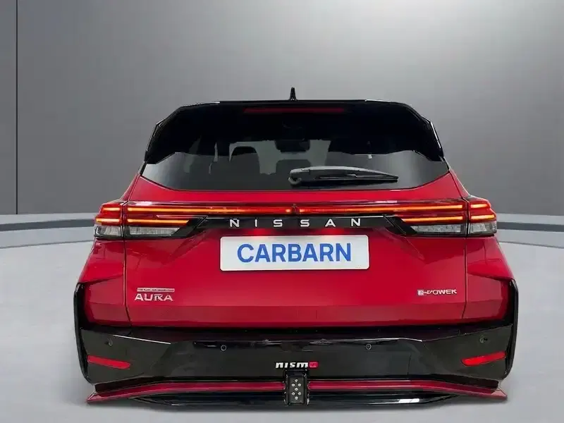 2023 Nissan AURA FE13 in Red — exterior view 5 2023 Nissan AURA FE13 in Red — exterior view 5
