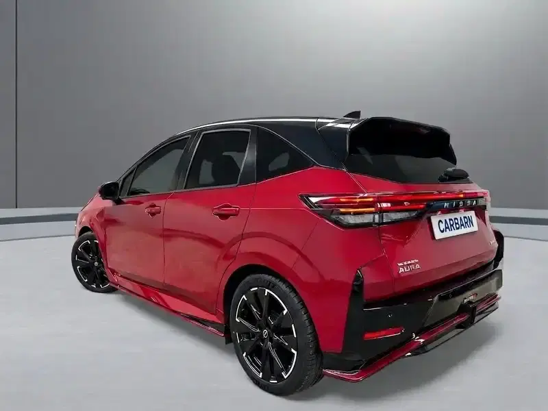 2023 Nissan AURA FE13 in Red — exterior view 4 2023 Nissan AURA FE13 in Red — exterior view 4