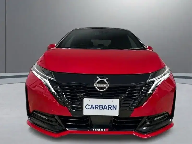 2023 Nissan AURA FE13 in Red — exterior view 8 2023 Nissan AURA FE13 in Red — exterior view 8