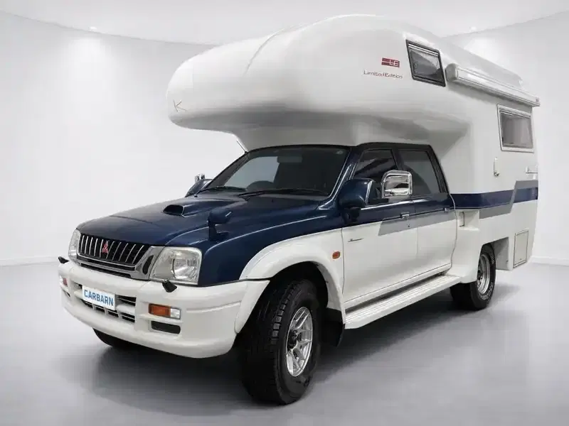 1999 Mitsubishi Strada K74T in Blue — exterior view 2 1999 Mitsubishi Strada K74T in Blue — exterior view 2