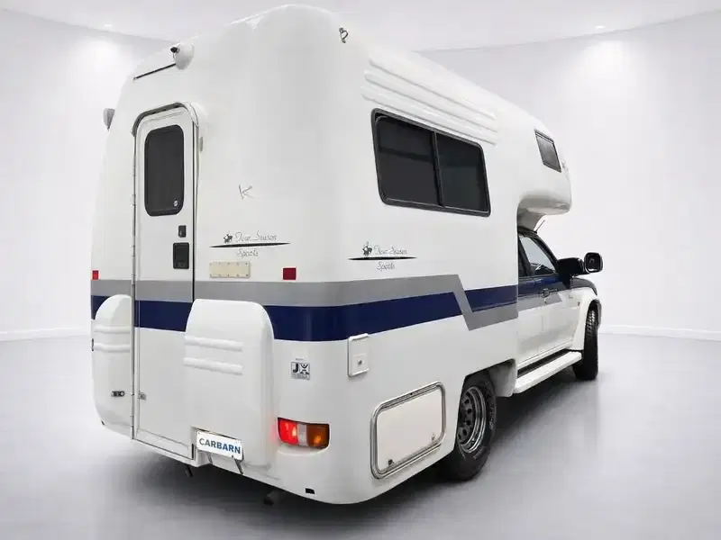 1999 Mitsubishi Strada K74T in Blue — exterior view 6 1999 Mitsubishi Strada K74T in Blue — exterior view 6