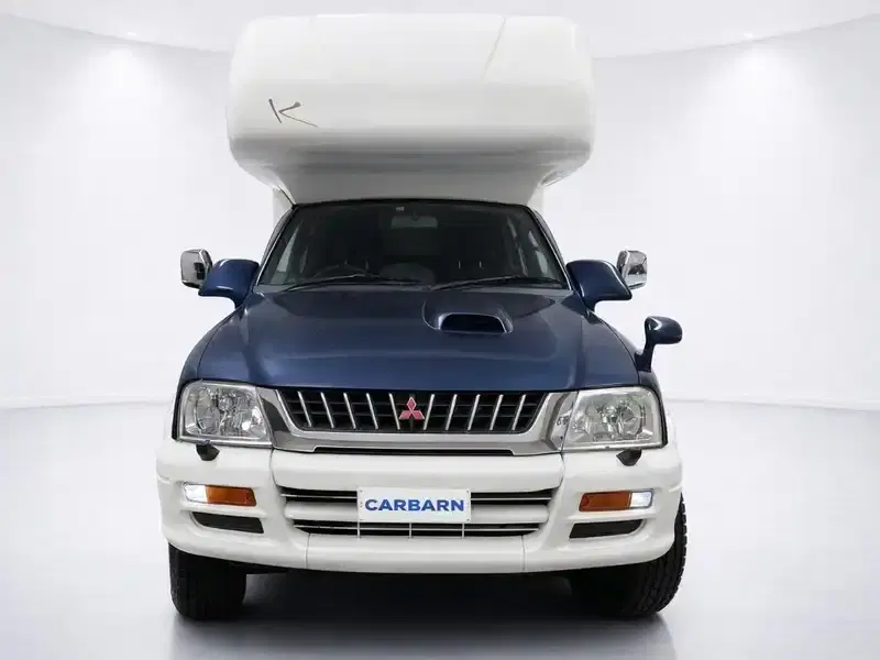 1999 Mitsubishi Strada K74T in Blue — exterior view 7 1999 Mitsubishi Strada K74T in Blue — exterior view 7