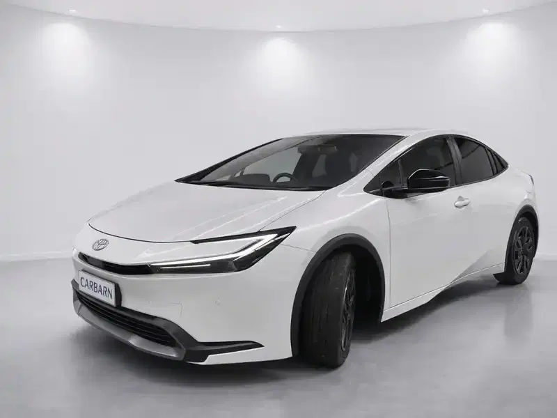 2024 Toyota Prius MXWH60 in Pearl — exterior view 2 2024 Toyota Prius MXWH60 in Pearl — exterior view 2