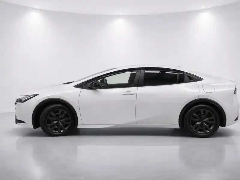 2024 Toyota Prius MXWH60 in Pearl — exterior view 3 2024 Toyota Prius MXWH60 in Pearl — exterior view 3