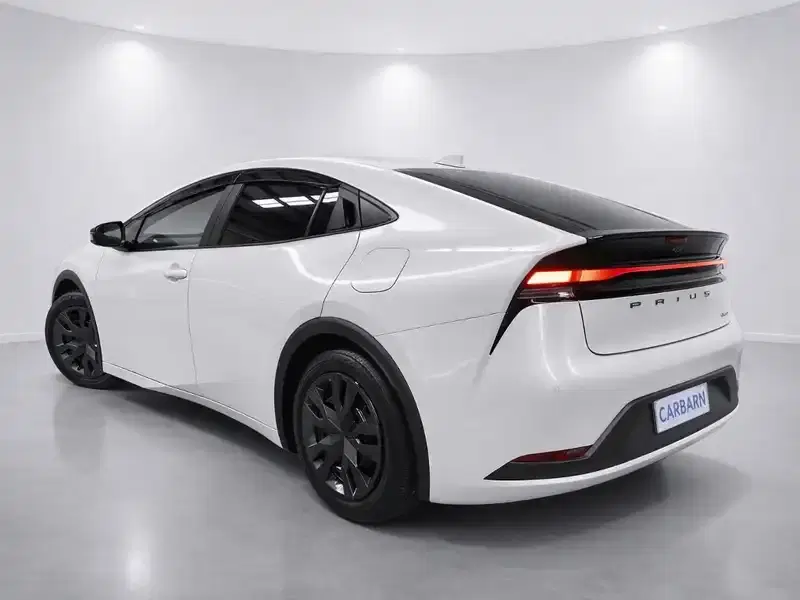 2024 Toyota Prius MXWH60 in Pearl — exterior view 4 2024 Toyota Prius MXWH60 in Pearl — exterior view 4