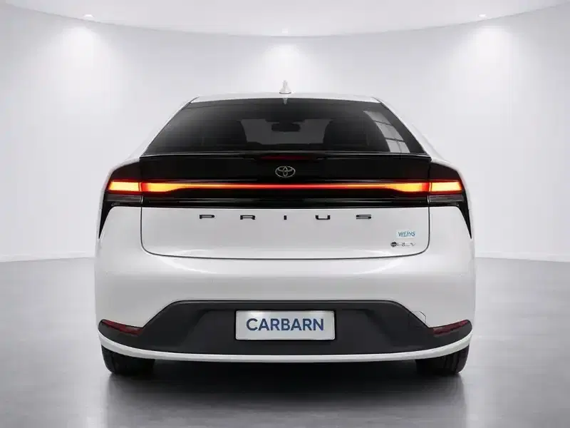 2024 Toyota Prius MXWH60 in Pearl — exterior view 5 2024 Toyota Prius MXWH60 in Pearl — exterior view 5
