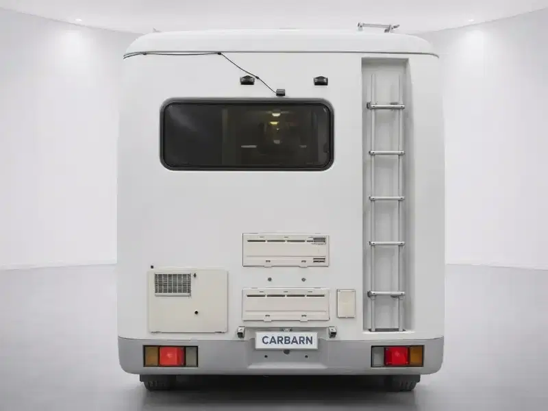1994 Isuzu ELF NHR69E in White — exterior view 5 1994 Isuzu ELF NHR69E in White — exterior view 5