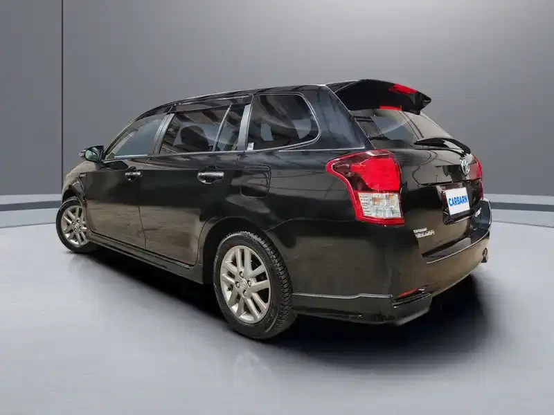 2014 Toyota Corolla Fielder NKE165G in Black — exterior view 4 2014 Toyota Corolla Fielder NKE165G in Black — exterior view 4