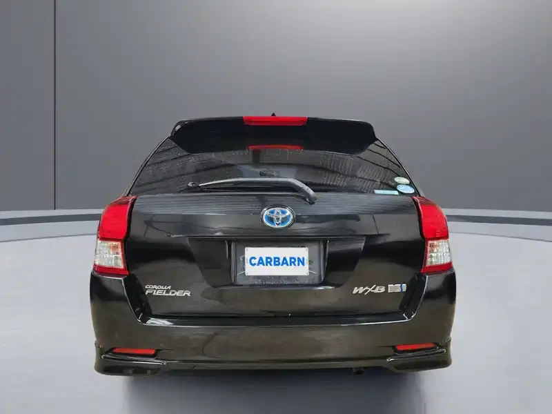 2014 Toyota Corolla Fielder NKE165G in Black — exterior view 5 2014 Toyota Corolla Fielder NKE165G in Black — exterior view 5
