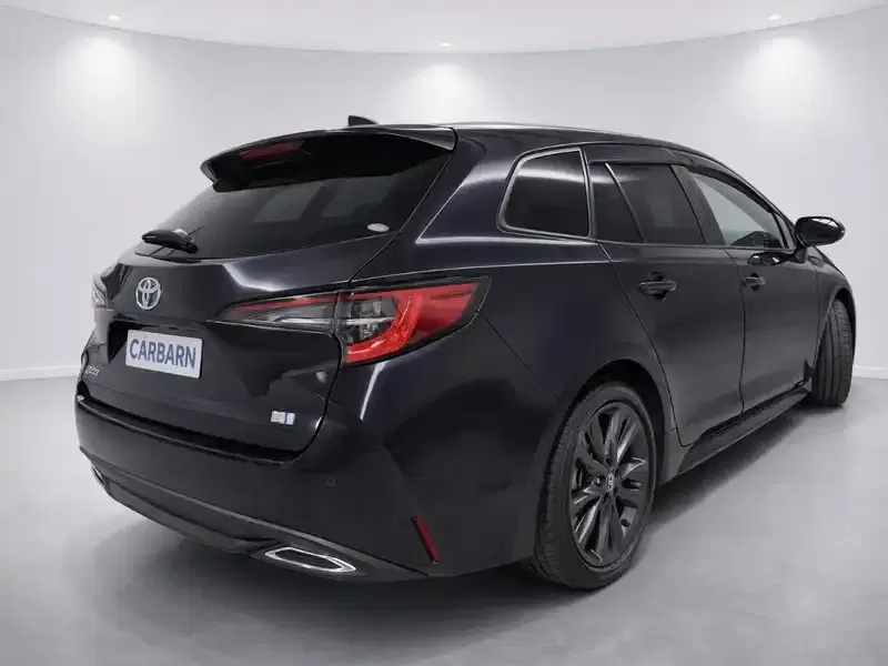 2022 Toyota Corolla ZWE211W in Black — exterior view 6 2022 Toyota Corolla ZWE211W in Black — exterior view 6