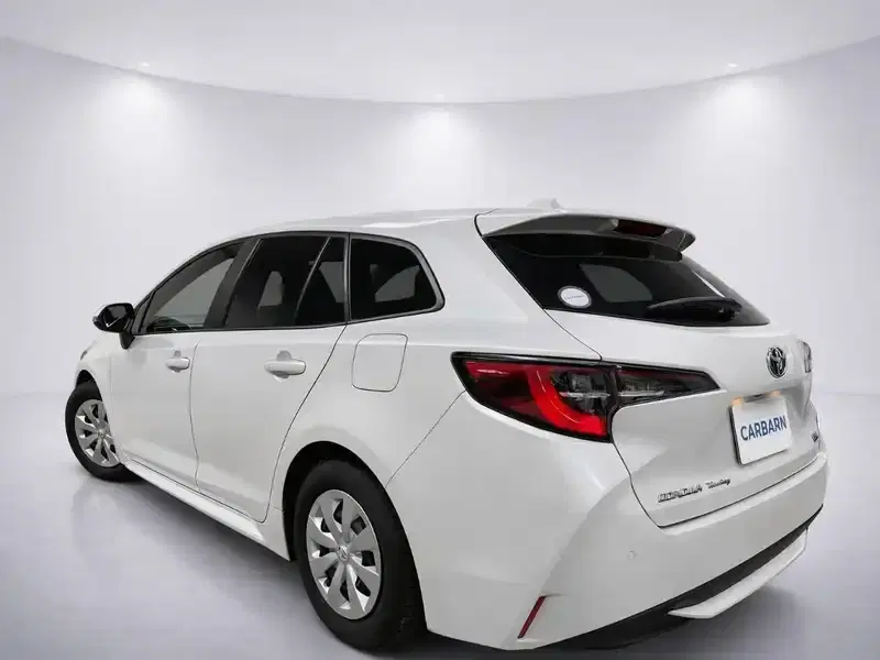 2022 Toyota Corolla ZWE211W in Pearl — exterior view 4 2022 Toyota Corolla ZWE211W in Pearl — exterior view 4